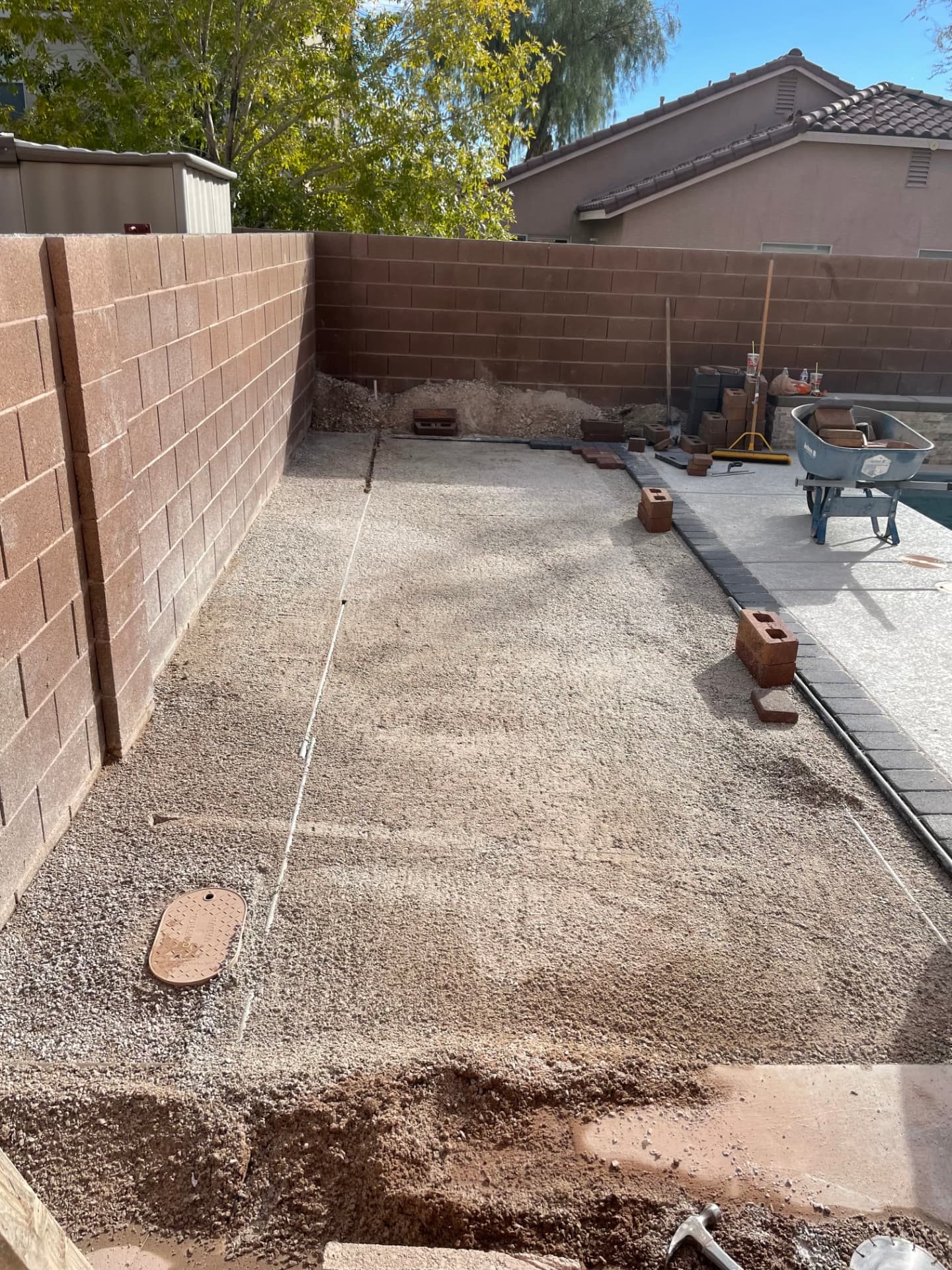 Base preparation and grading for a new paver patio